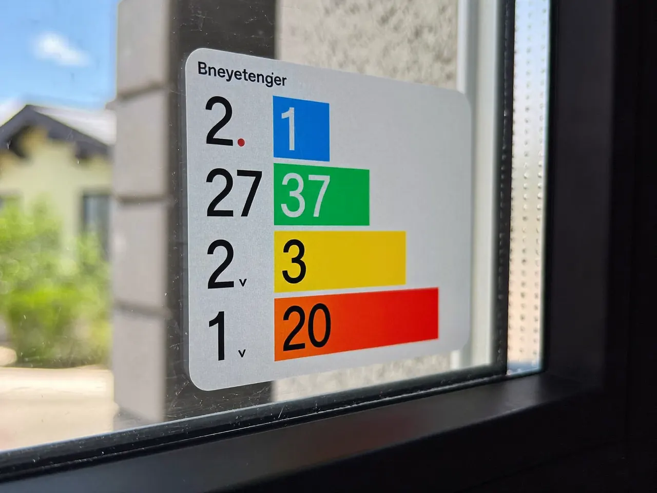 Close-up of an energy-rating label on a window