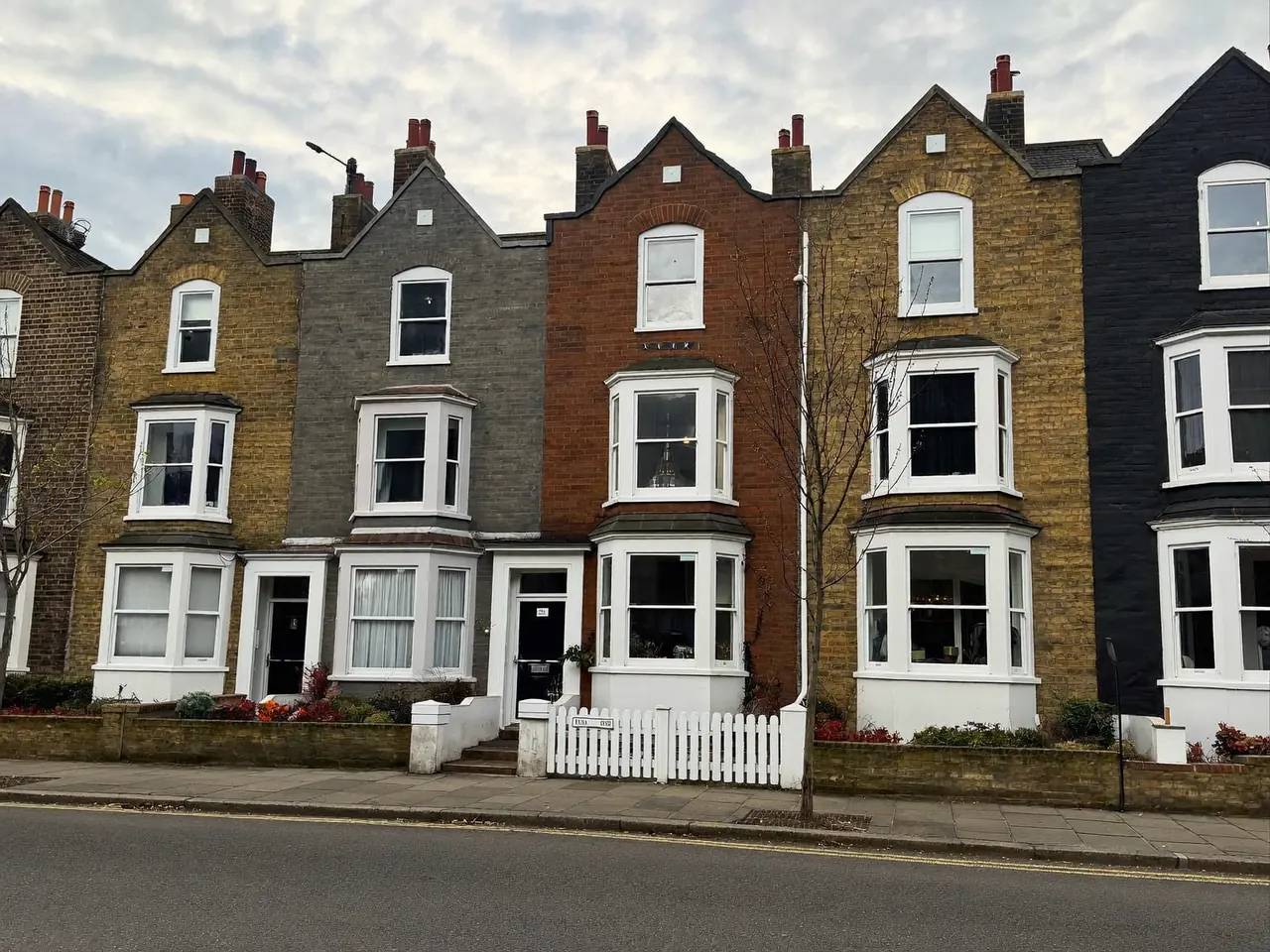 Row of UK terraced houses with double glazing