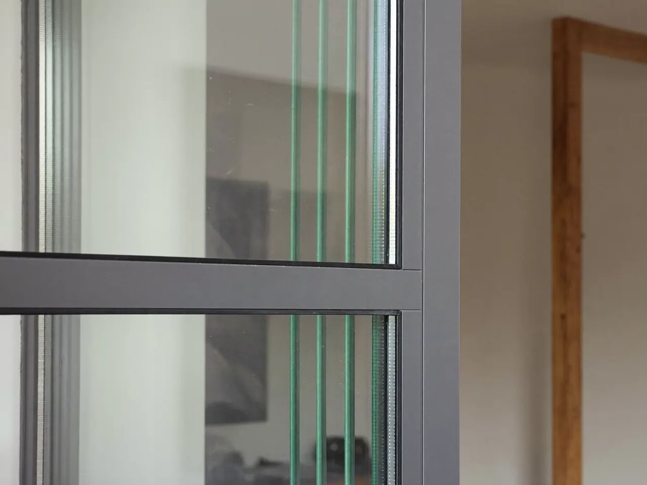 Corner of a modern triple-glazed window frame